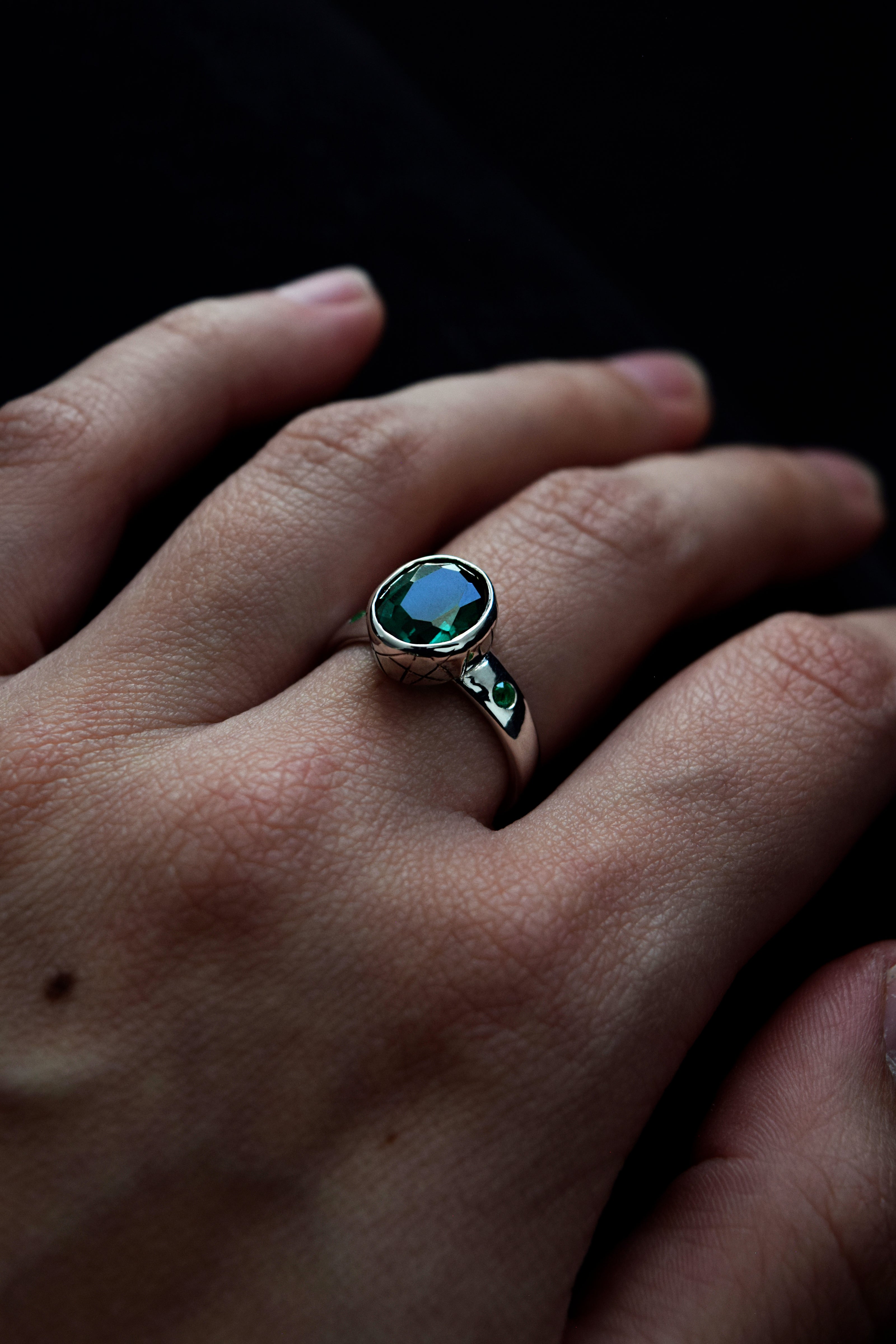 silver and emerald handcrafted ring